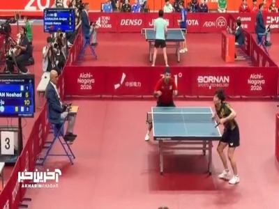 لحظاتی از مسابقه نوشاد عالمیان و حریف چین تایپه در مرحله یک چهارم نهایی